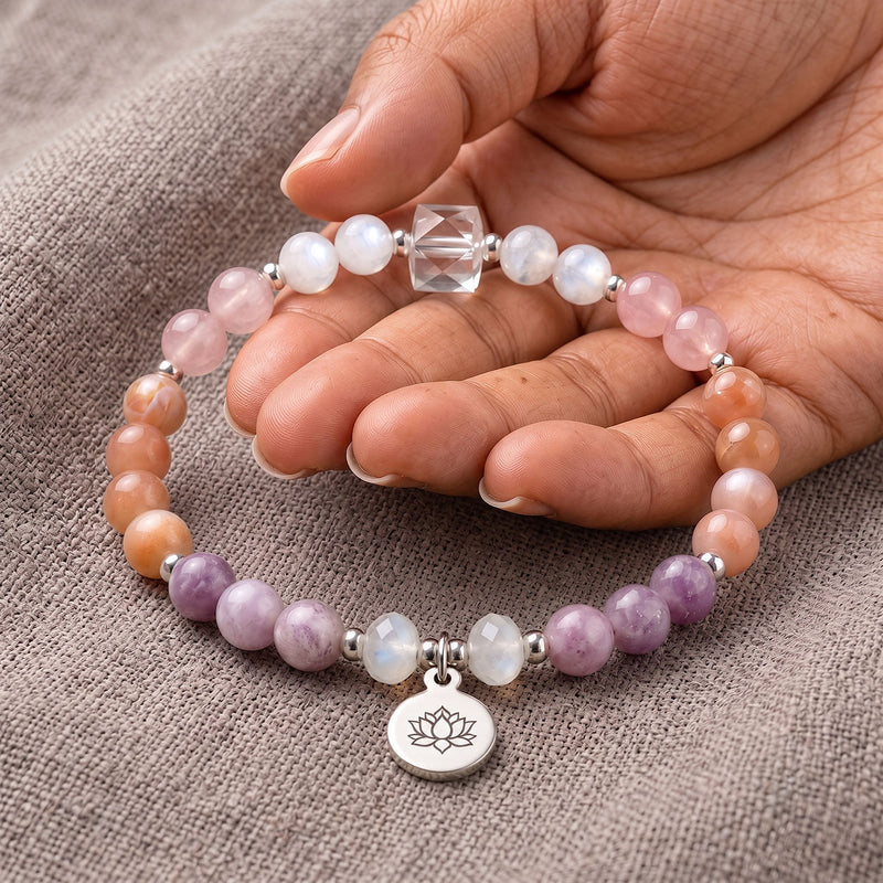 menopause crystal gemstone beaded bracelet resting on woman's hand