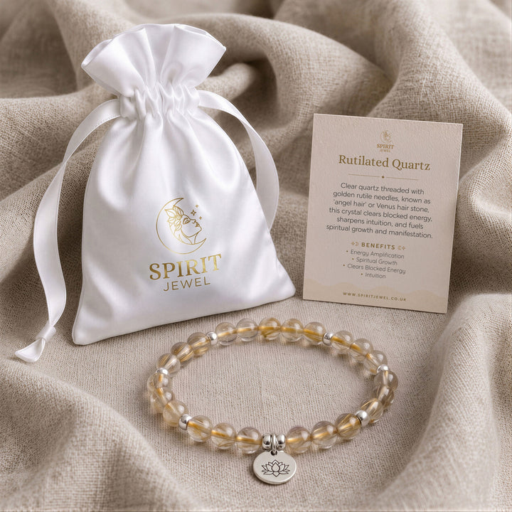 Rutilated Quartz beaded crystal bracelet in a Spirit Jewel gift pouch with a crystal meaning card