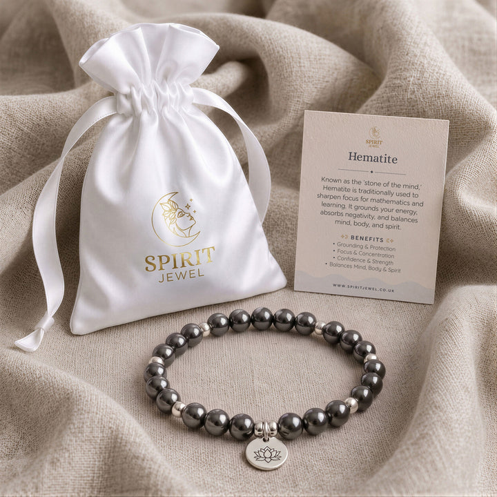 Hematite beaded crystal bracelet in a Spirit Jewel gift pouch with a crystal meaning card