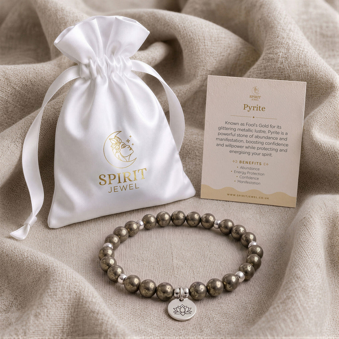 Pyrite beaded crystal bracelet in a Spirit Jewel gift pouch with a crystal meaning card