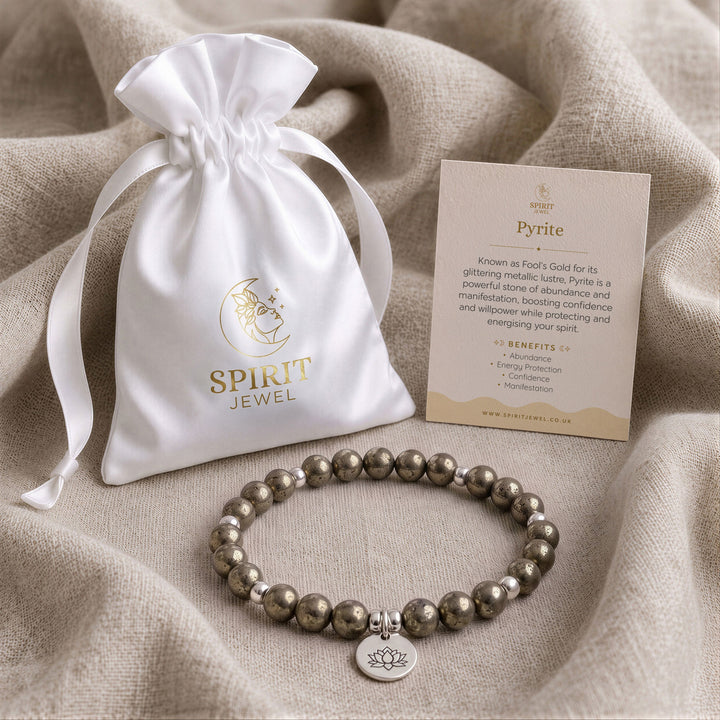 Pyrite beaded crystal bracelet in a Spirit Jewel gift pouch with a crystal meaning card